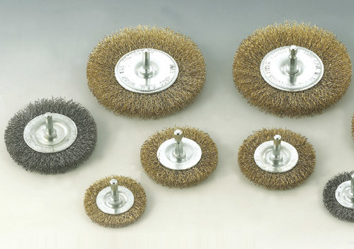 Shaft-mounted wheel brushes